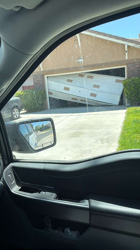 Before and after garage door replacement in Culver City showing dramatic transformation