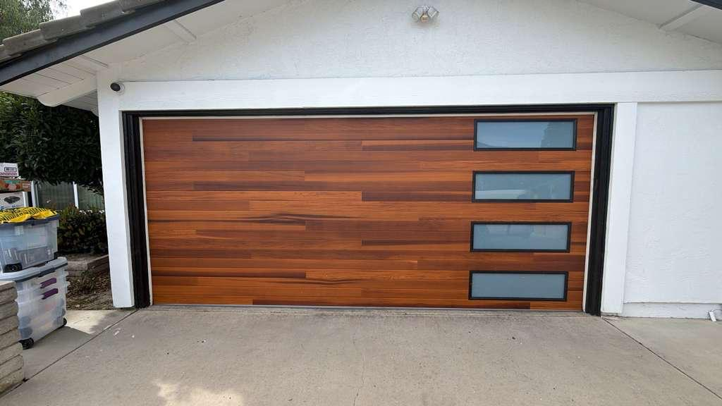Modern garage door showcasing essential garage door maintenance tips