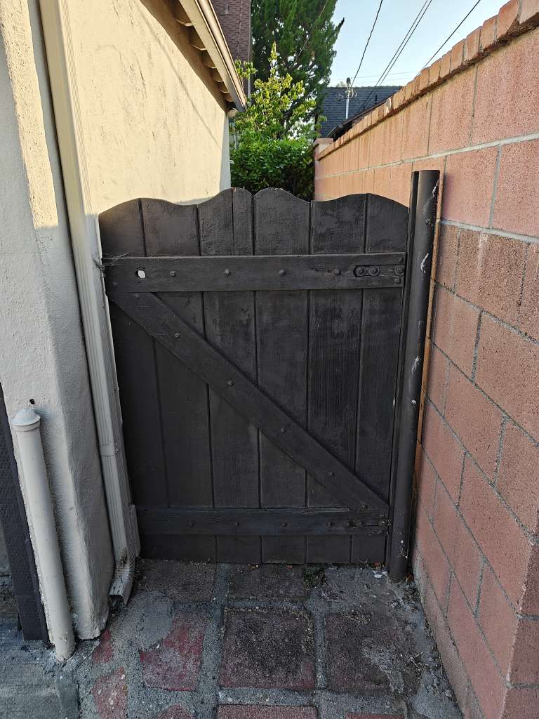 Two separate single car garage doors on Sherman Oaks residential building freshly serviced by MSB